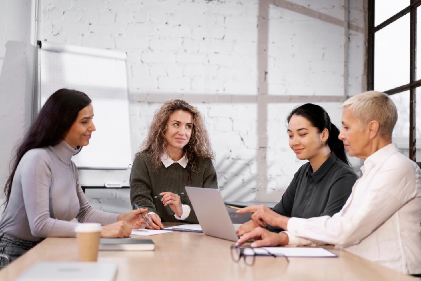 Analyst reviewing financial models and data on multiple screens